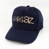 Gorillaz_Modelo8_Diagonal_Dorado Gorra Gorillaz