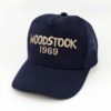 Woodstock_Modelo8_Diagonal_Dorado Gorra Woodstock